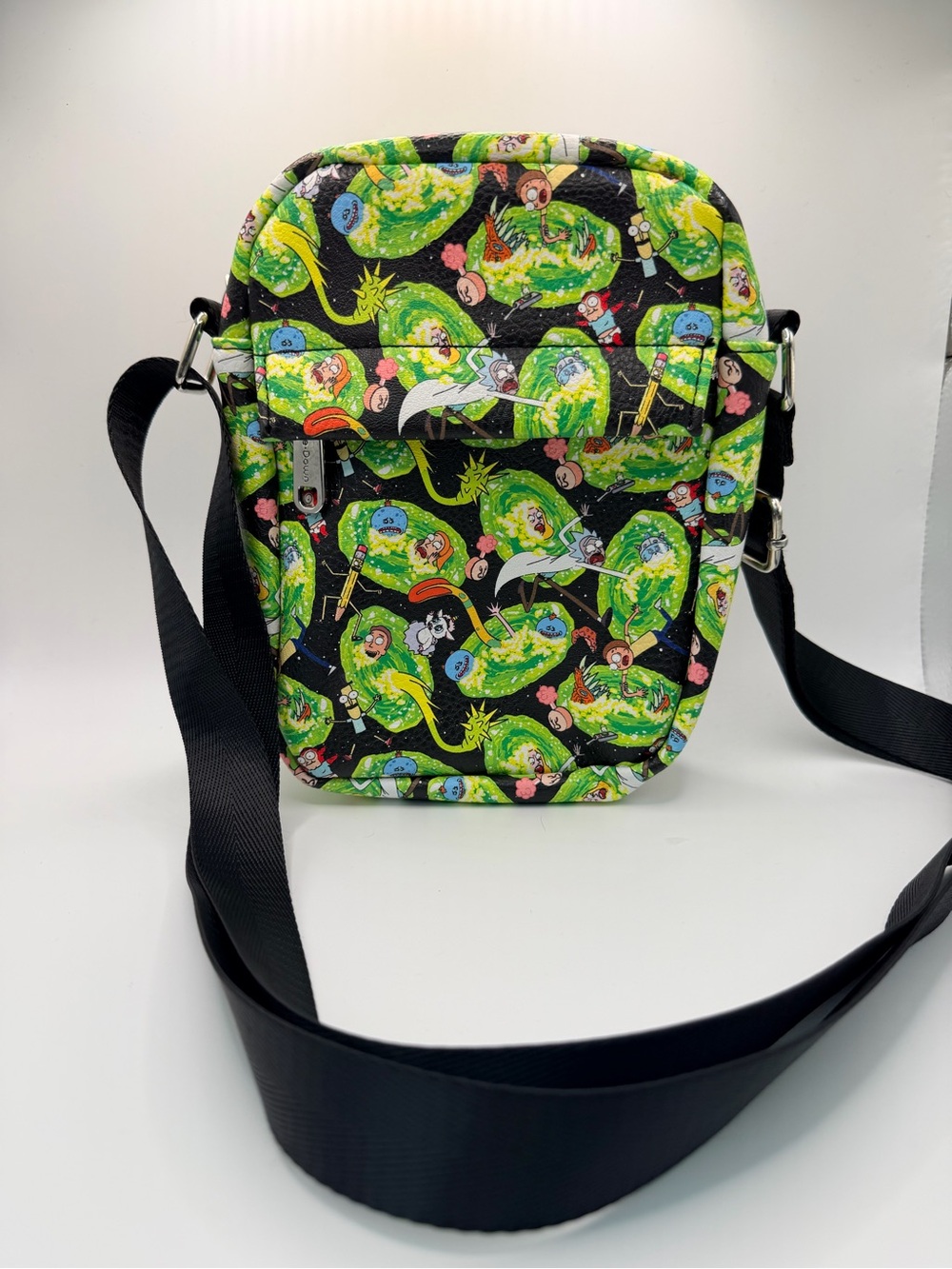 This is the Rick and Morty "Chaotic Portal" Small Crossbody Bag